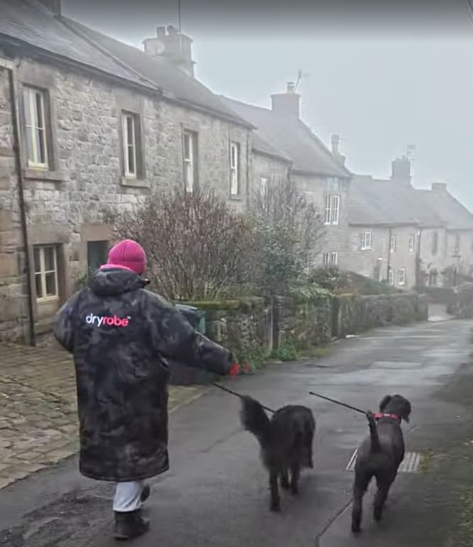 Walking dogs through Winster village